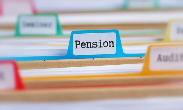 File folders with a tab labeled Pension